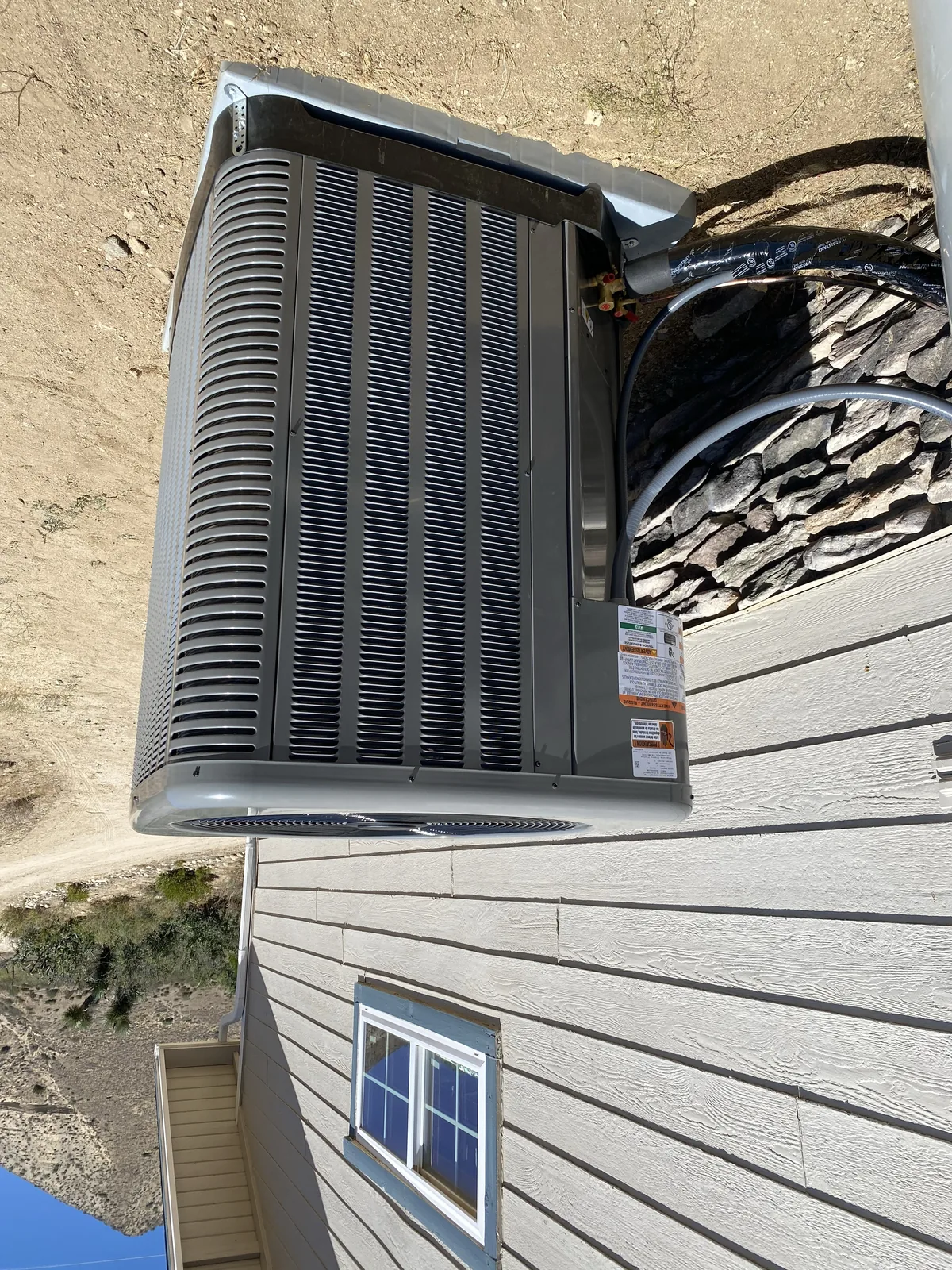 AC condenser installed by JC Energy Solutions, HVAC service in Rialto, California