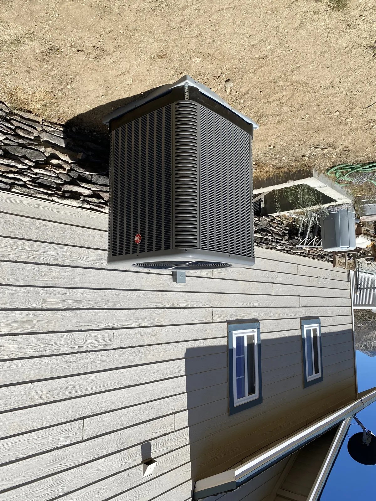 Outdoor HVAC condenser installed by JC Energy Solutions in the High Desert